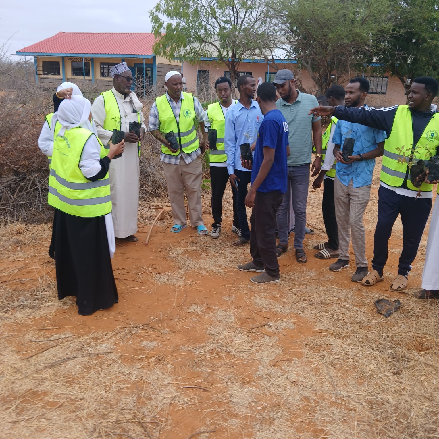 HOME WEPG official interacting with Wargadud Mix Secondary School students and educating them about the environment