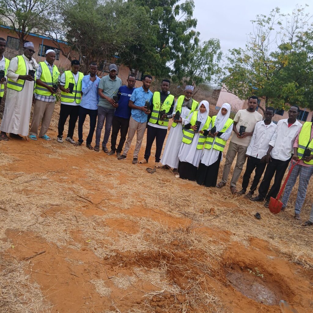 HOME Wepg authorities in a meeting with a Wargadud Mix Secondary School principal and deputy principal
